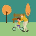 Simple Vector illustration background about young father help his son learning to ride a bicycle in the countryside together. Royalty Free Stock Photo