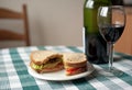 Simple vegetarian sandwich with a glass of wine Royalty Free Stock Photo