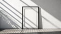 Simple Vertical Black Frame Mockup with Sun Ray Shadows on Wall Royalty Free Stock Photo