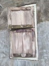 Simple village window structure. Wood , plaster and stone. Natural colours