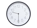 Simple wall clock with black frame and white face displaying 09:30 or 21:30. Royalty Free Stock Photo