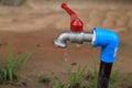 Simple water faucet in a garden