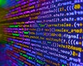 Simple website HTML code with colorful tags in browser view on dark background. Real Html code developing screen. Computer code on