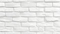 Simple white brick wall with light gray shades seamless pattern surface texture background Royalty Free Stock Photo