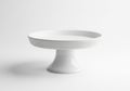 Simple white ceramic cake stand isolated on white background Royalty Free Stock Photo