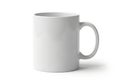 A simple white ceramic mug with a handle, standing alone against a plain background Royalty Free Stock Photo