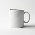 Simple white ceramic mug on plain background Royalty Free Stock Photo