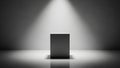 Simple white cube podium under a spotlight in a dark studio Royalty Free Stock Photo