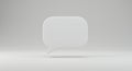 A simple, white 3D speech bubble floats against a plain gray background. The speech Royalty Free Stock Photo