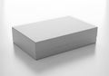 A simple white rectangular box casting a subtle shadow on a light gray surface Royalty Free Stock Photo