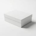 A simple white rectangular box on a white surface Royalty Free Stock Photo