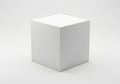 A simple white rectangular prism rests centered against a plain light gray background Royalty Free Stock Photo