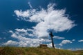Simple wooden catholic cross on the top of a hill in Transylvania, Romania Royalty Free Stock Photo