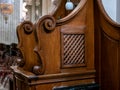 Simple wooden confessional in a church closeup detail, nobody, no people. Confession, confessing sins religious concept