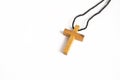Simple Wooden Cross Necklace on iSolated White Background Royalty Free Stock Photo