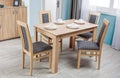 Simple wooden dinning table and chairs in interior - studio Royalty Free Stock Photo