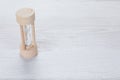 Simple wooden egg timer measuring passing time Royalty Free Stock Photo