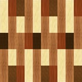 Simple wooden inlays composed of rectangles of differently colored wood. Wooden texture, floor parquet.