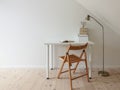 Simple workspace interior. Open book in minimalist home office