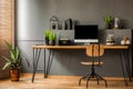 Simple workspace interior with wooden chair at the desk standing