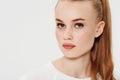 Through simplicity comes great beauty. Portrait of a beautiful young woman standing in a studio.