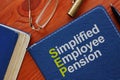 Simplified Employee Pension SEP is shown on the conceptual business photo
