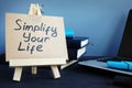 Simplify your life written on a piece of paper
