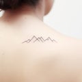 Simplistic Cartoon Mountain Tattoo For Women\'s Back