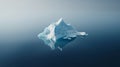 Simplistic image of solitary iceberg adrift in blue ocean