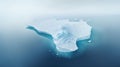 Simplistic image of solitary iceberg adrift in blue ocean