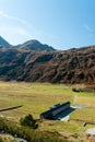 Simplon pass, alpine landscape of a mountain pass with church an Royalty Free Stock Photo