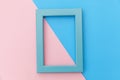 Simply design with empty blue frame isolated on pink and blue pastel colorful background