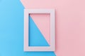 Simply design with empty pink frame isolated on pink and blue pastel colorful background