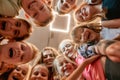 Simply happy. Group of positive boys and girls with their female dance teacher. Bottom view of happy children smiling at