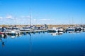 Simrishamn, Sweden - May 13, 2019: Boats at the marina on sunny day with reflectiom on water Royalty Free Stock Photo