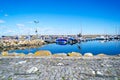 Simrishamn, Sweden - May 13, 2019: Boats at the marina on sunny day with reflectiom on water Royalty Free Stock Photo