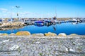 Simrishamn, Sweden - May 13, 2019: Boats at the marina on sunny day with reflectiom on water Royalty Free Stock Photo