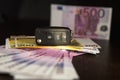 Simulation loan foCar key and Euro banknotes on brown background with shallow depth of fieldr car purchase. Five hundred Royalty Free Stock Photo