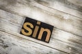 Sin Letterpress Word on Wooden Background Royalty Free Stock Photo