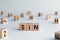 sin - word from wooden blocks with letters Royalty Free Stock Photo