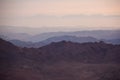 Sinai desert with sand and sun rise in december with mountains a Royalty Free Stock Photo