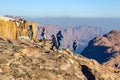 Sinai Peninsula, Egypt, May 9, 2019: Pilgrims meet the dawn on the Moses Mountain, Sinai Peninsula, Egypt