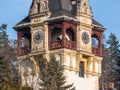 Architecture detail with one of the Peles Castle towers. Castle tower with a clock Royalty Free Stock Photo