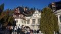 Sinaia, Romania - December 31, 2022: People going near Peles castle Sinaia in winter season, Transylvania, Romania Royalty Free Stock Photo