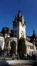 Sinaia, Romania - December 31, 2022: People going near Peles castle Sinaia in winter season, Transylvania, Romania Royalty Free Stock Photo