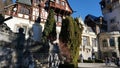 Sinaia, Romania - December 31, 2022: People going near Peles castle Sinaia in winter season, Transylvania, Romania Royalty Free Stock Photo