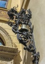 Detailed metal bell structure at Peles Castle