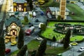 Toy railroad layout with buildings, peoples, ambulances