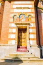Sinaia, Romania - March 09, 2019: back entrance, wood door, Sinaia Monastery located in Sinaia, Prahova, Romania