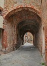 Sinalunga, Siena, Tuscany, Italy: ancient alley in the old town Royalty Free Stock Photo